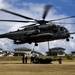 CH-53 transports howitzer during RIMPAC amphib landing demo