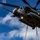 CH-53 transports howitzer during RIMPAC amphib landing demo