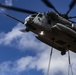 CH-53 transports howitzer during RIMPAC amphib landing demo