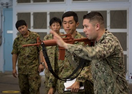 Petty Officer conducts training with JGSDF members