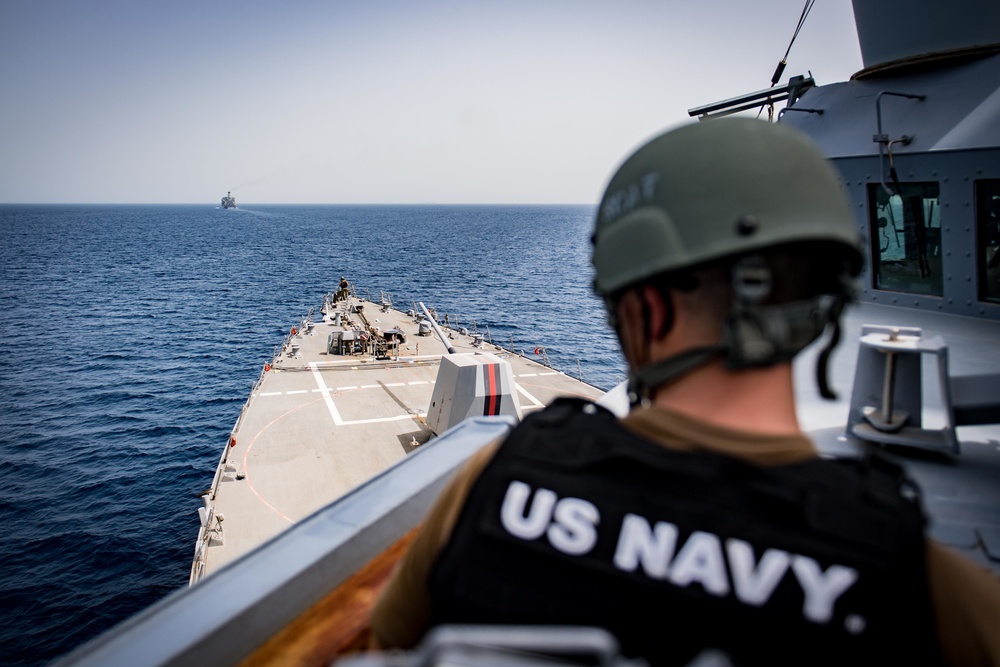 USS Jason Dunham escorts USNS Laramie through Bab al-Mandeb