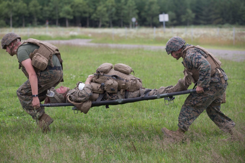 Navy Corpsman perform a casualty evacuation drill for ARTP 18-2