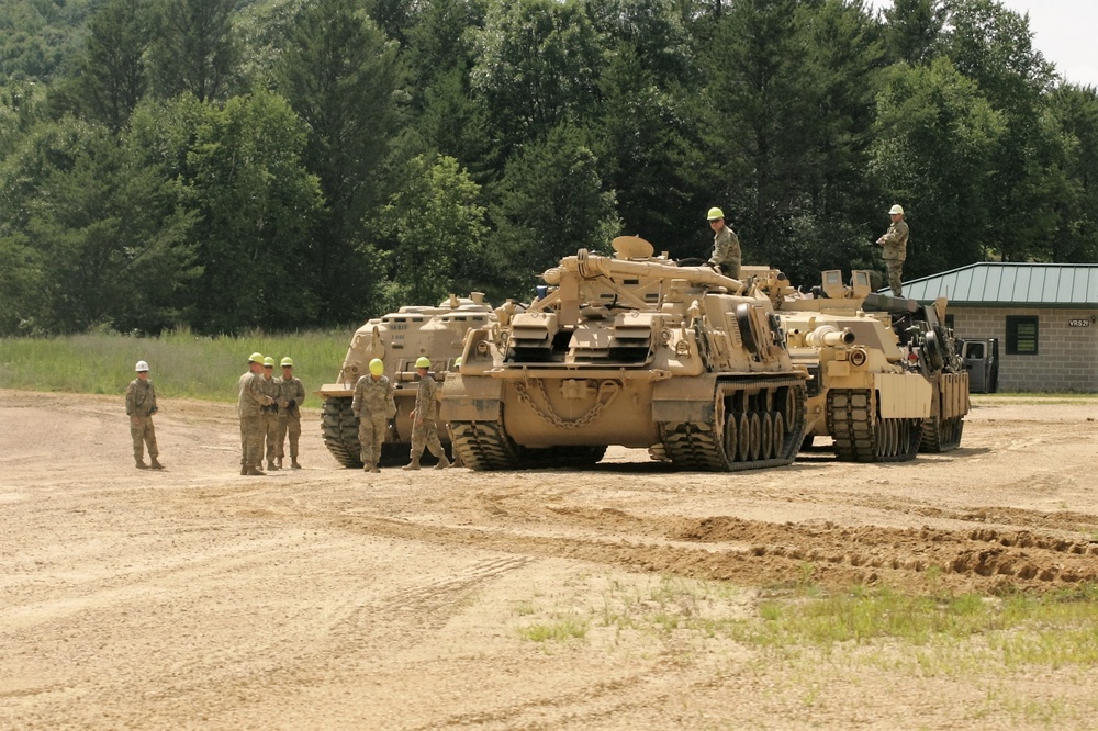Students build skills in tracked vehicle recovery during RTS-Maintenance course at Fort McCoy