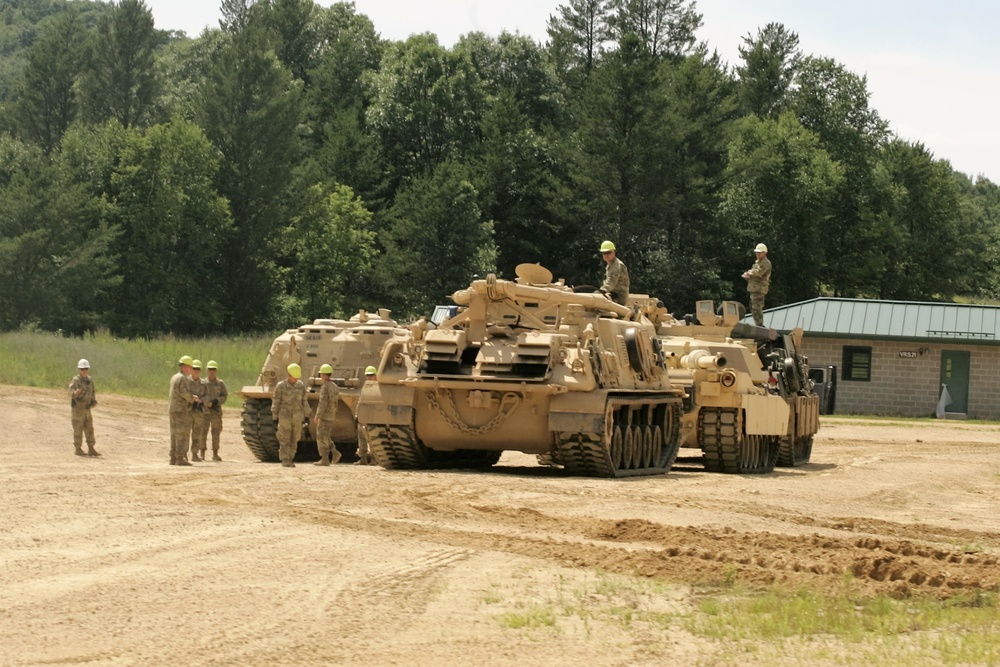 Students build skills in tracked vehicle recovery during RTS-Maintenance course at Fort McCoy