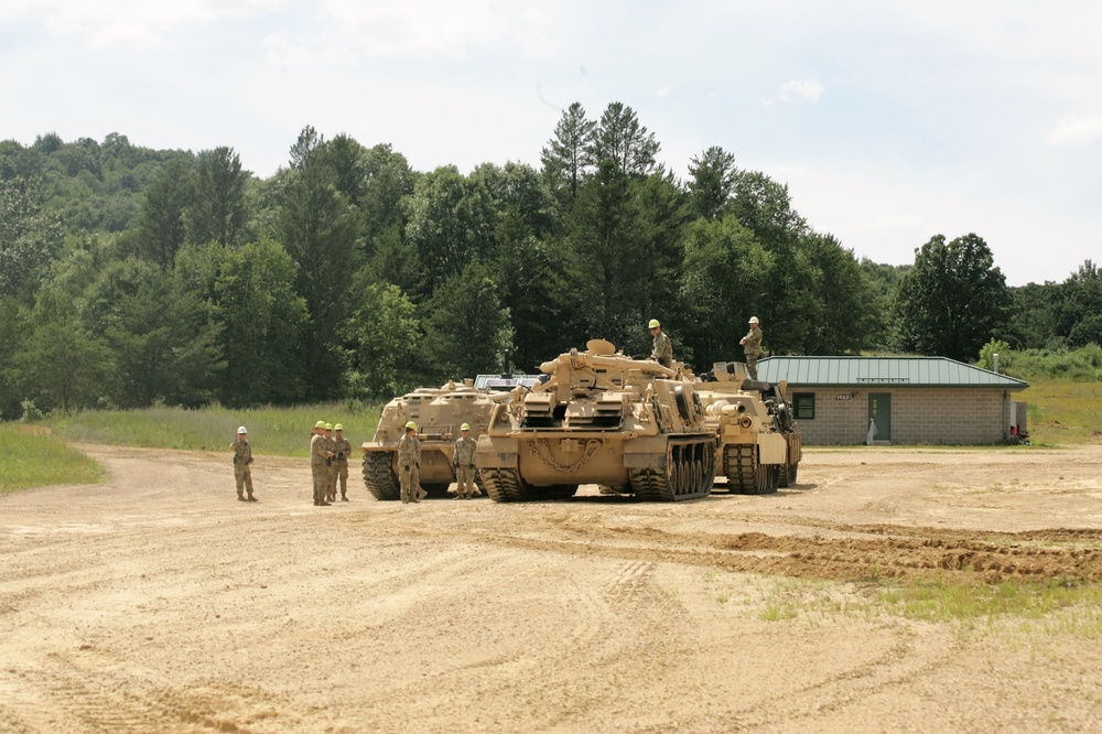 Students build skills in tracked vehicle recovery during RTS-Maintenance course at Fort McCoy