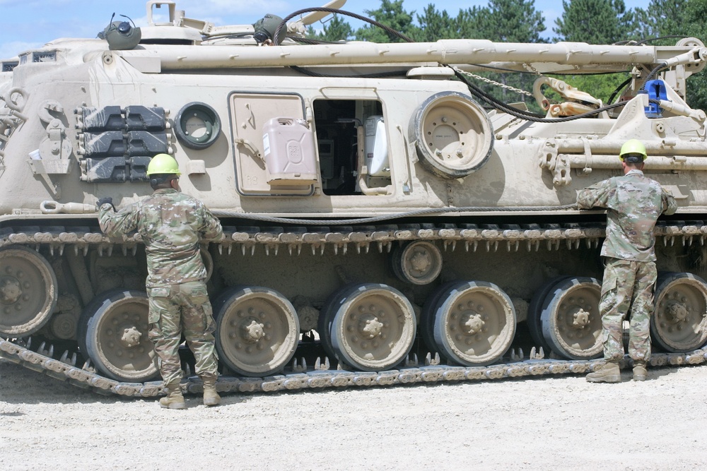 Students build skills in tracked vehicle recovery during RTS-Maintenance course at Fort McCoy