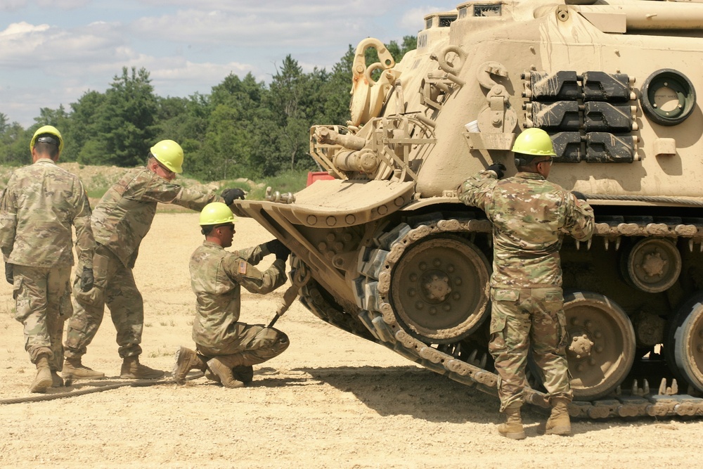 Students build skills in tracked vehicle recovery during RTS-Maintenance course at Fort McCoy