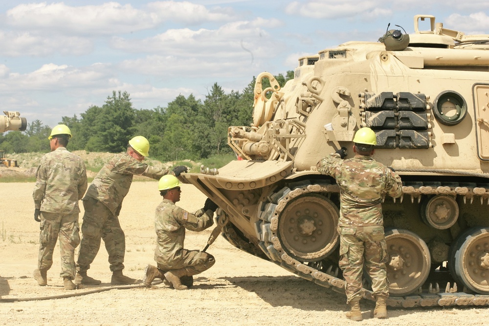 Students build skills in tracked vehicle recovery during RTS-Maintenance course at Fort McCoy