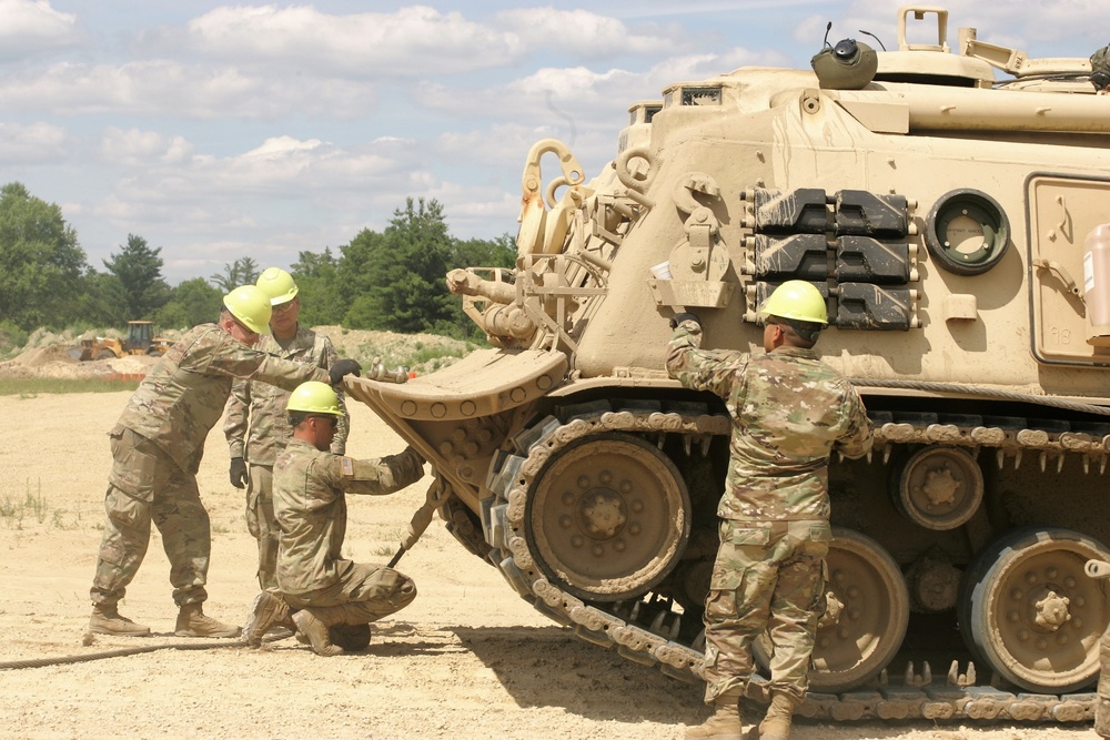 Students build skills in tracked vehicle recovery during RTS-Maintenance course at Fort McCoy