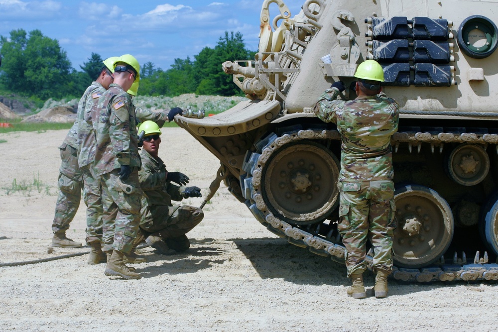 Students build skills in tracked vehicle recovery during RTS-Maintenance course at Fort McCoy