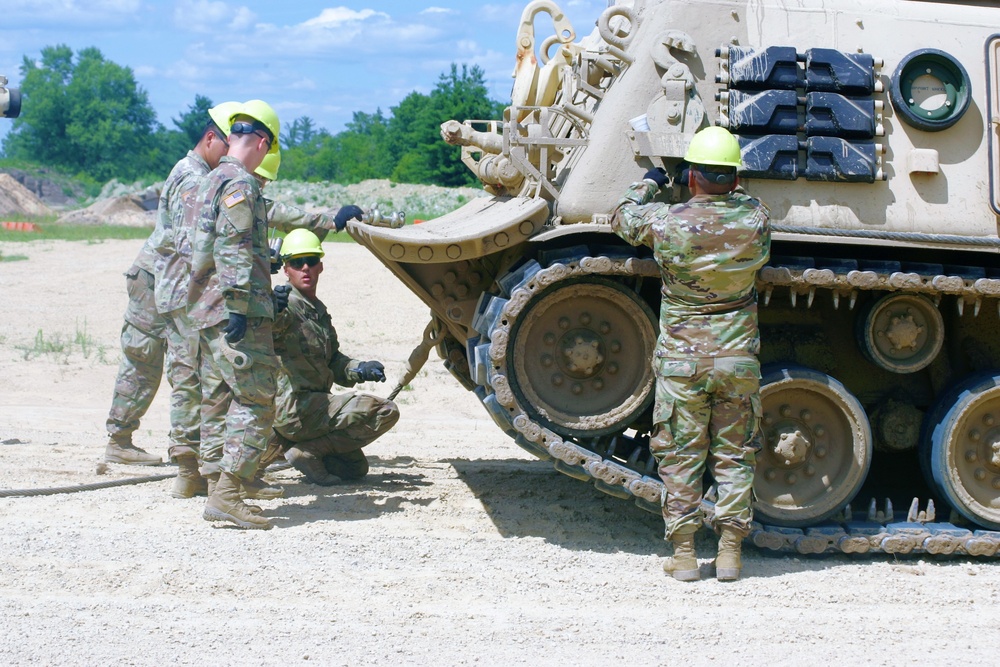 Students build skills in tracked vehicle recovery during RTS-Maintenance course at Fort McCoy