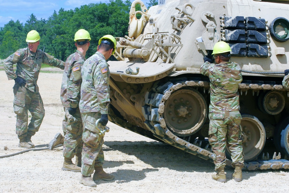 Students build skills in tracked vehicle recovery during RTS-Maintenance course at Fort McCoy