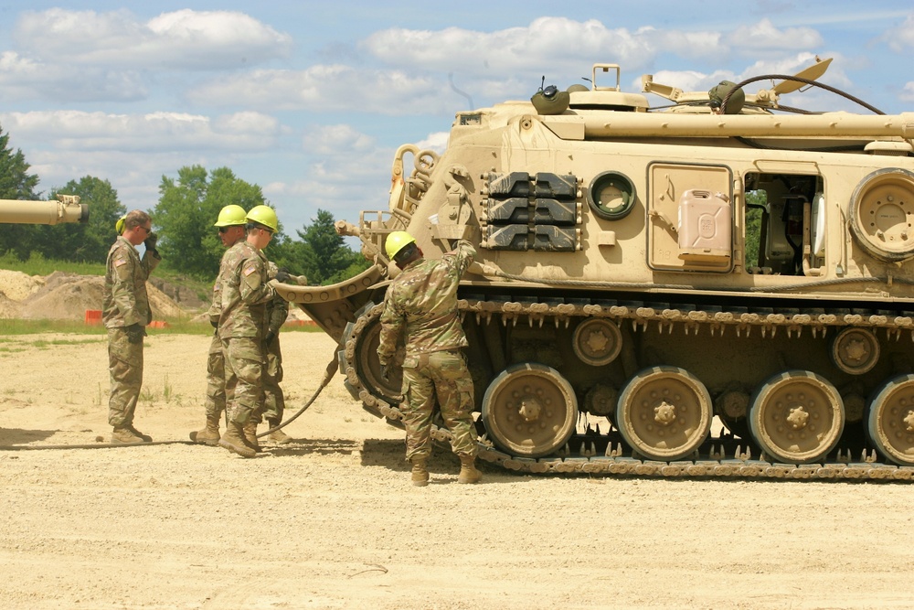 Students build skills in tracked vehicle recovery during RTS-Maintenance course at Fort McCoy