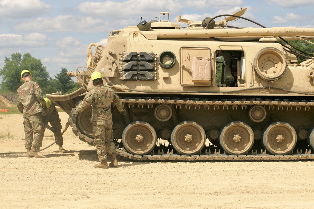 Students build skills in tracked vehicle recovery during RTS-Maintenance course at Fort McCoy