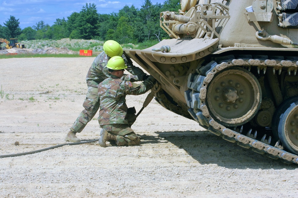 Students build skills in tracked vehicle recovery during RTS-Maintenance course at Fort McCoy