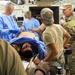 U.S. Army Reserve Soldiers assigned to 228th Combat Support Hospital, based out of San Antonio, Texas, provide medical care for a simulated patient during Global Medic CSTX 91-18-01, at Fort Hunter Liggett, California, July 21, 2018.