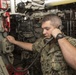 Sailors do maintenance on the Ohio-class ballistic submarine USS Alaska