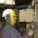 Sailors do maintenance on the Ohio-class ballistic submarine USS Alaska