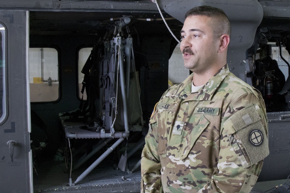Spc. Jason Lee conducts an interview