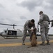 374th MWD's Fly With the 459th Airlift Squadron