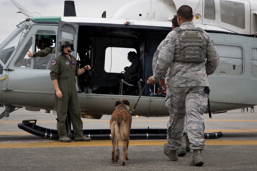 374th MWD's Fly With the 459th Airlift Squadron