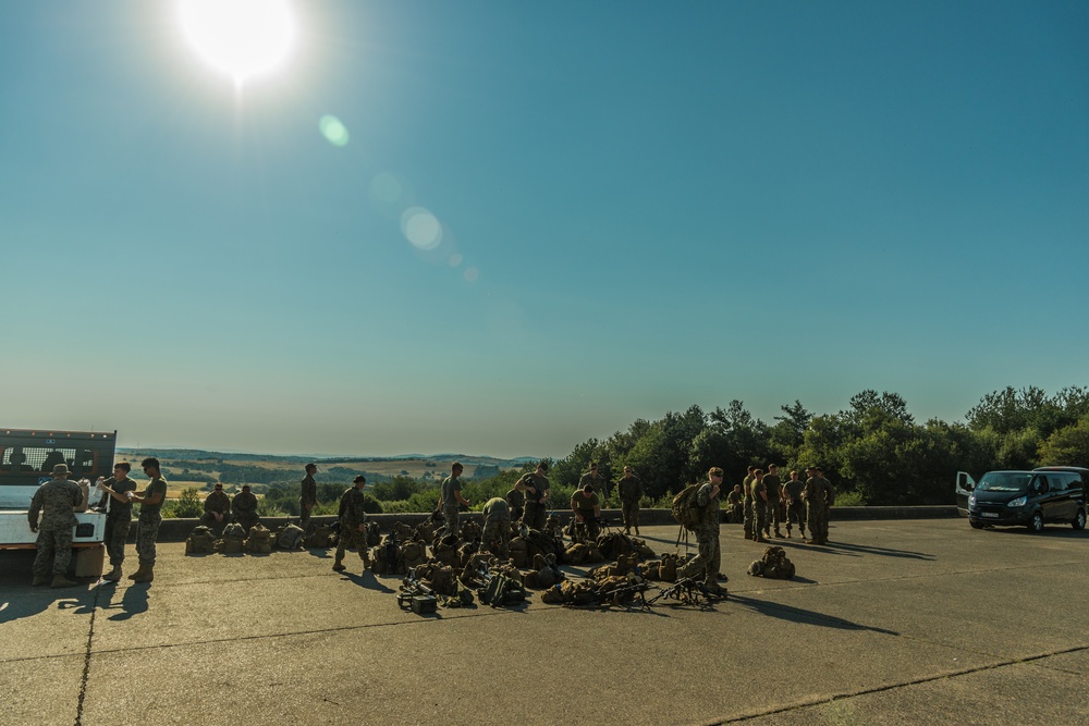 Marines dismounts maneuvering to an objective