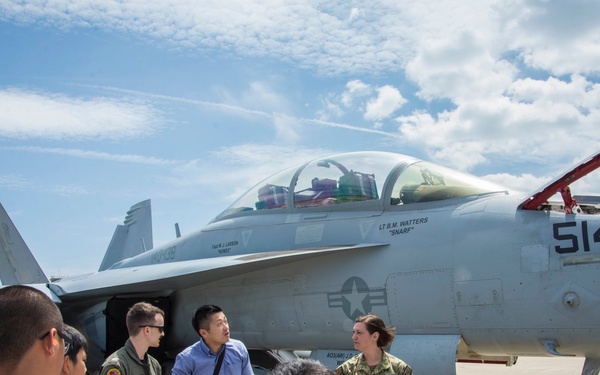 Officer gives tour of E/A-18