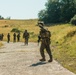 Marines dismounts maneuvering to an objective