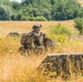 Marines dismounts maneuvering to an objective