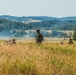 Marines dismounts maneuvering to an objective