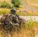 Marines dismounts maneuvering to an objective