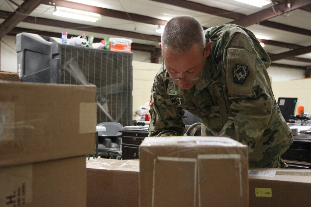 213th Personnel Company postal section delivers morale at NTC
