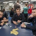 Sailors Participate In Poker Tournament