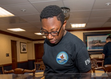 Sailor Checks In to GHWB
