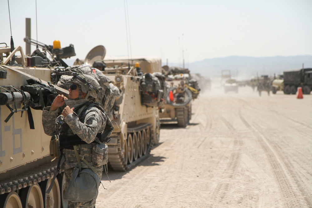 Soldiers with the 56th Stryker Brigade Combat Team roll out to the box