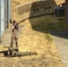 Spc. Bradey Petit takes OCS Phase III photos at Leschi Town