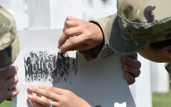Soldier with the Oklahoma Guard pays tribute to fallen relative at WWI cemetery