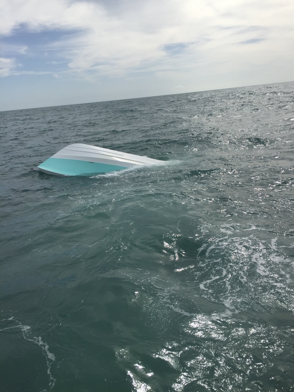 Coast Guard rescues 4 from capsizing vessel near Freeport, Texas