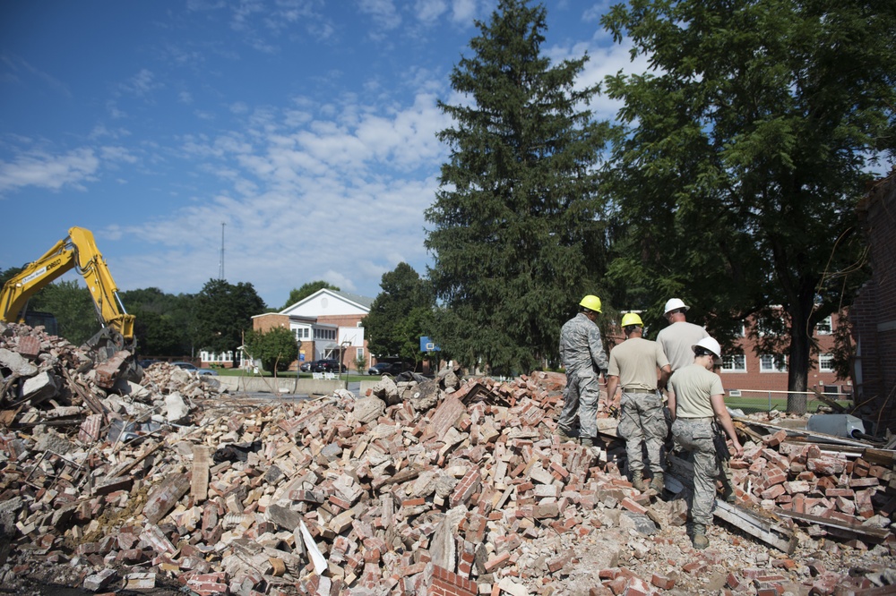 Airmen assess condemned building during Innovative Readiness Training