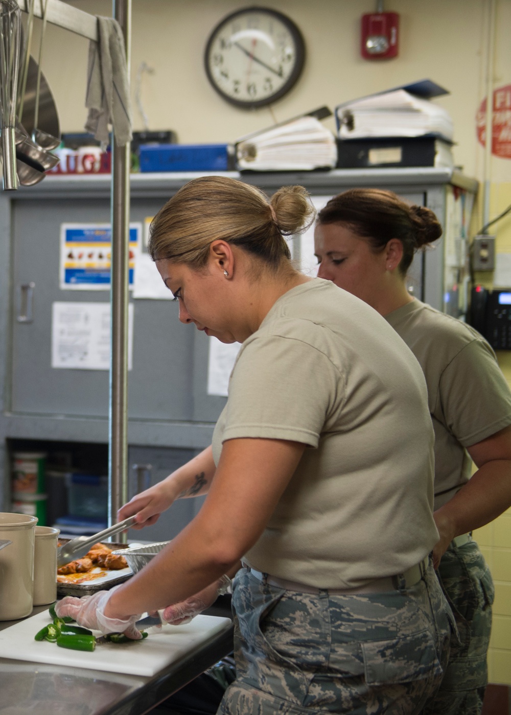 Airmen prepare lunch at school during Innovative Readiness Training