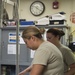 Airmen prepare lunch at school during Innovative Readiness Training