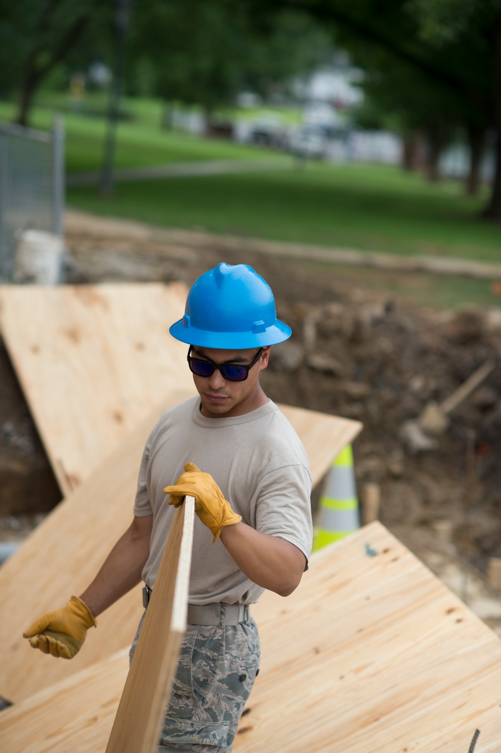 Airmen assists with building new wheelchair ramps