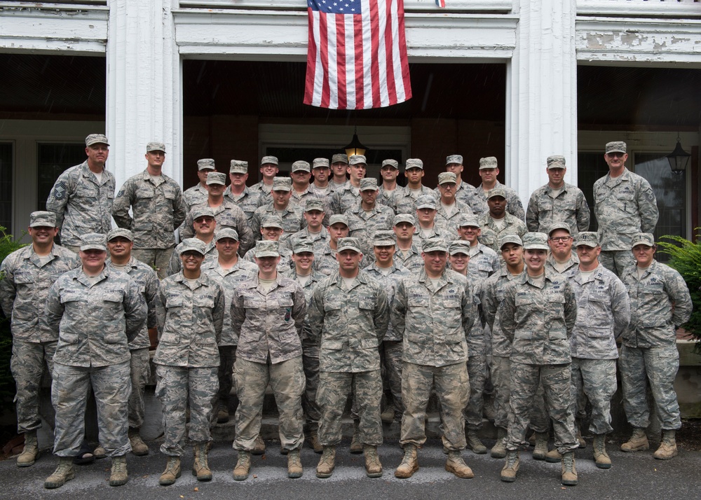 Airmen participating in the Innovative Readiness Training program pose for a group photo