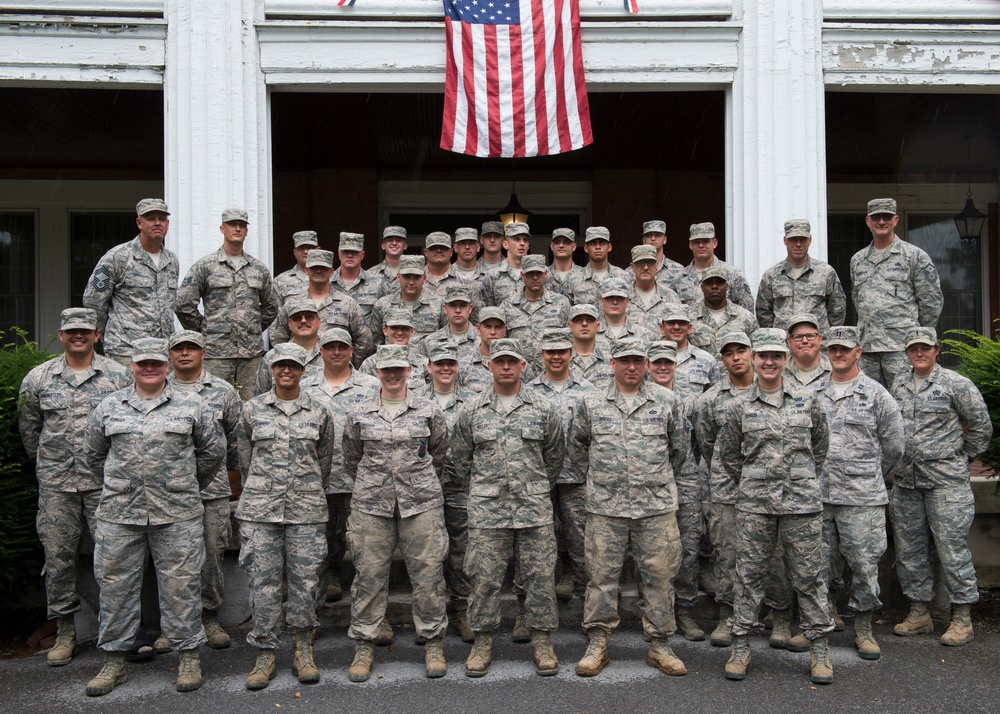 Airmen participating in the Innovative Readiness Training program pose for a group photo