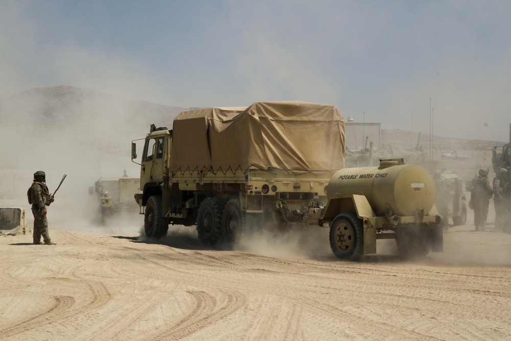 Soldiers with the 56th Stryker Brigade Combat Team roll out to the box