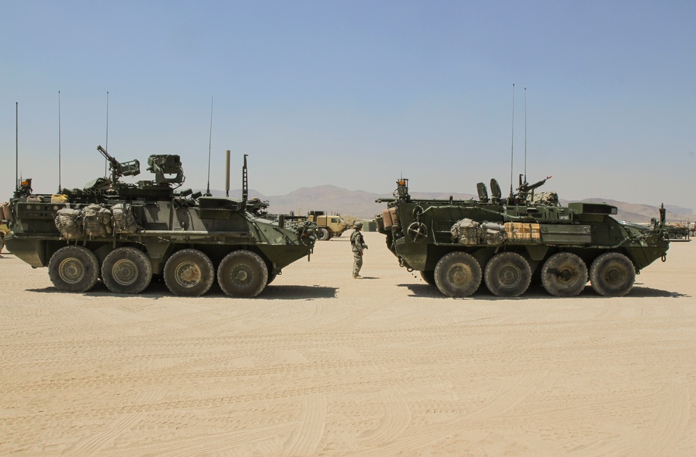 Soldiers with the 56th Stryker Brigade Combat Team roll out to the box