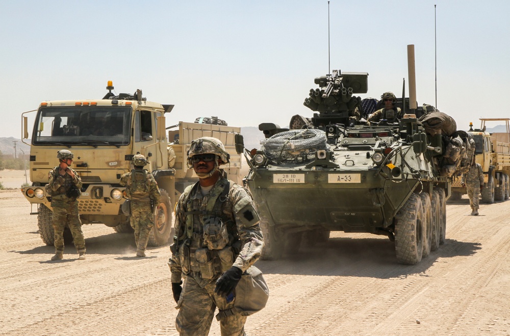 Soldiers with the 56th Stryker Brigade Combat Team roll out to the box