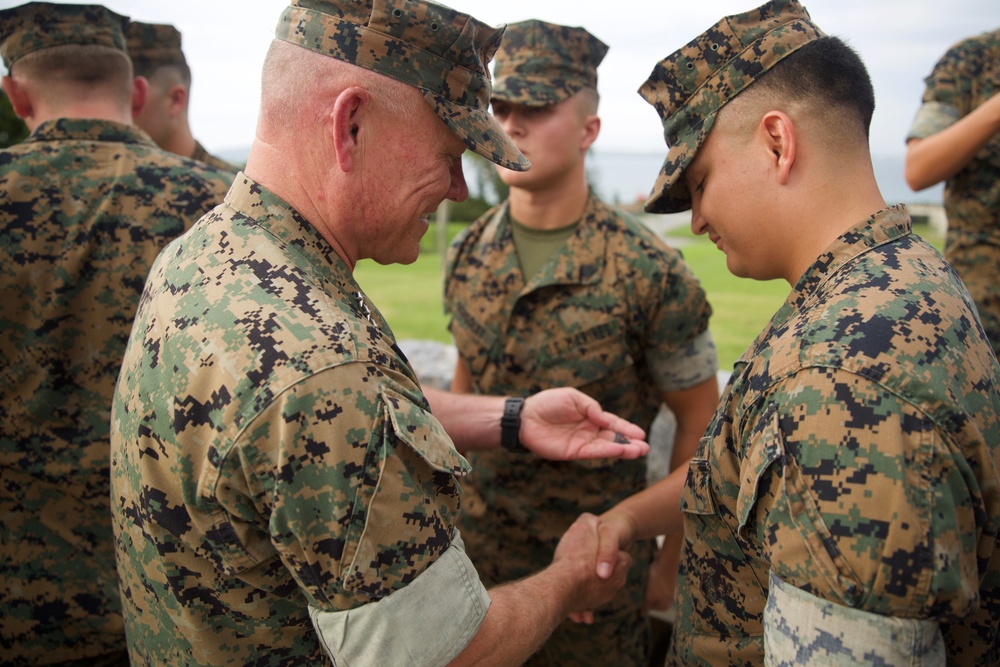 III MEF Commanding General meritoriously promotes Marines, Sailor