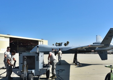 California Fires: Maintainers lift MQ-9s for wildfire missions
