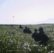 Marines with Company F fire and maneuver in Japan's hills